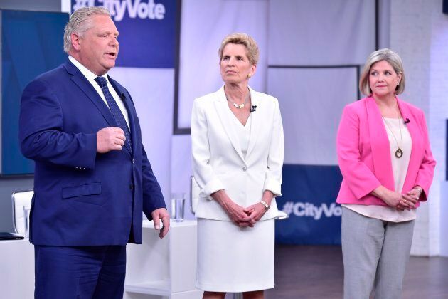 Ontario Liberal Leader Kathleen Wynne, centre, Progressive Conservative Leader Doug Ford, left, and NDP Leader Andrea Horwath take part in the Ontario Leaders debate in Toronto on May 7, 2018.