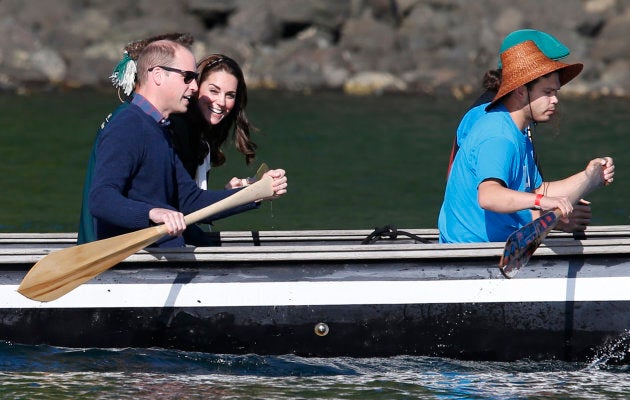 Prince William and Catherine, Duchess of Cambridge, tour in a canoe during a visit to Haida Gwaii in Skidegate, B.C., Sept. 30, 2016.