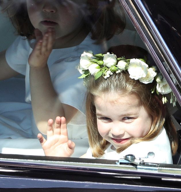 Princess Charlotte waves to the crowd.