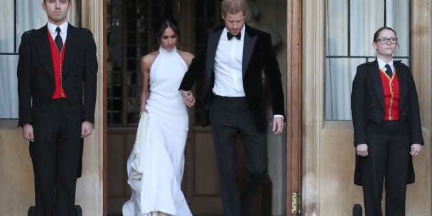 The Duke and Duchess of Sussex leave Windsor Castle after their wedding to attend an evening reception at Frogmore House, hosted by the Prince of Wales.