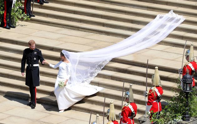 Prince Harry, Duke of Sussex and The Duchess of Sussex leave St George's Chapel, Windsor Castle after their wedding ceremony on May 19, 2018.