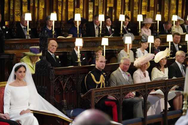 The Queen and Prince Philip are seen in the second row of the chapel.