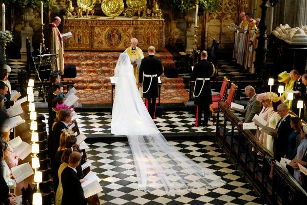 Prince Harry and Meghan Markle stand at the altar together at St. George's Chapel.