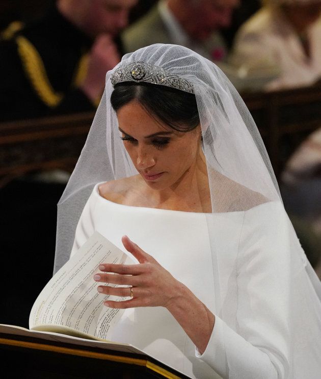 Meghan Markle at the High Altar during her wedding to Britain's Prince Harry, Duke of Sussex in St George's Chapel, Windsor Castle, in Windsor, on May 19, 2018.