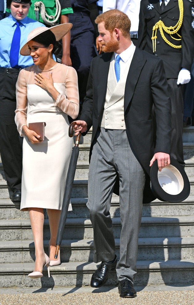 The Duke and Duchess of Sussex at a garden party at Buckingham Palace in London.