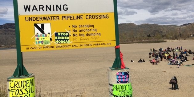 People rally at a “Picnics not Pipelines” event in Kamloops, B.C. on April 22, 2018.