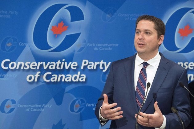 Conservative Party Leader Andrew Scheer speaks to reporters during a meeting of the General Council of the Conservative Party of Canada in Saint-Hyacinthe, Que., on May 13, 2018.