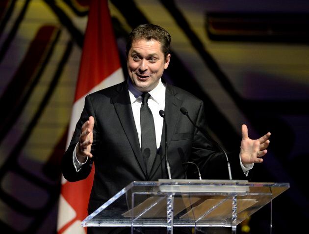 Conservative Leader Andrew Scheer jokes during his speech at the Parliamentary Press Gallery Dinner at the Museum of History in Gatineau, Quebec on Saturday.