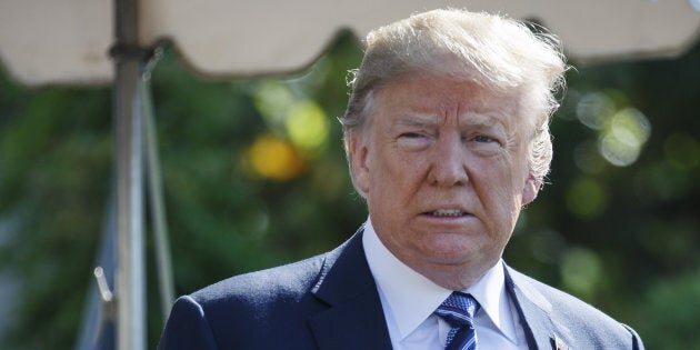 U.S. President Donald Trump speaks to members of the media before boarding Marine One while departing the White House in Washington, D.C., on Friday, May 25, 2018.