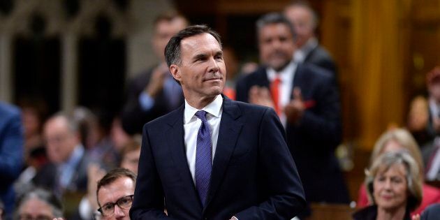 Minister of Finance Bill Morneau rises in the House of Commons on May 29, 2018.