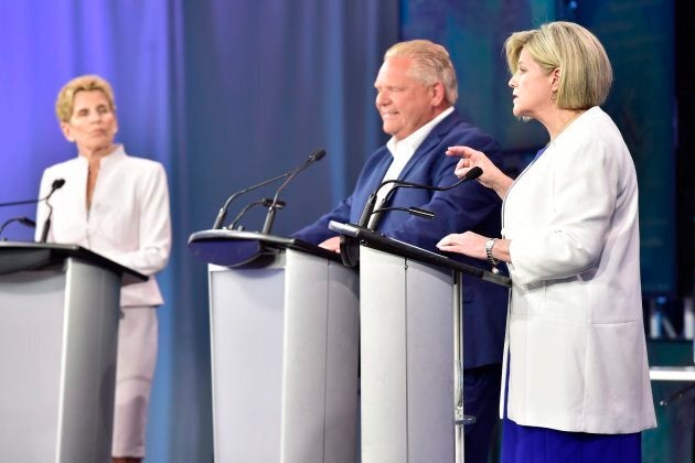 Ontario Liberal Leader Kathleen Wynne, left to right, Ontario Progressive Conservative Leader Doug Ford and Ontario NDP Leader Andrea Horwath participate during the third and final televised debate of the provincial election campaign in Toronto on May 27, 2018.