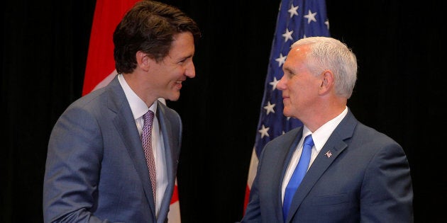 Prime Minister Justin Trudeau and United States Vice President Mike Pence meet on the sidelines of the...