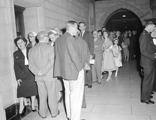 Crowds line up to watch pipeline debates in the House of Commons in June 1956.