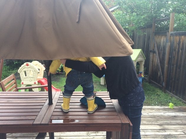 The author and her son enjoying a relaxing afternoon on her backyard patio.