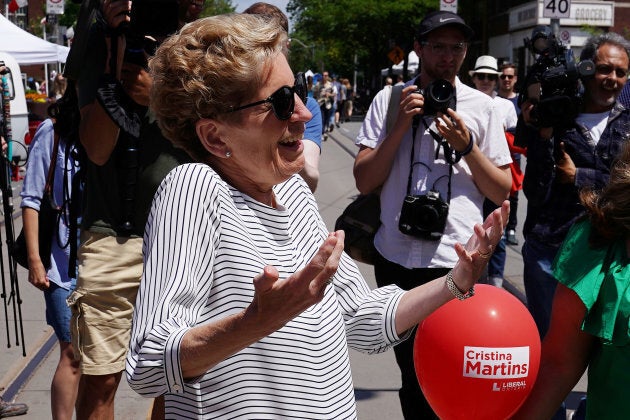 Ontario Premier Kathleen Wynne attends a street festival during a campaign stop in Toronto on June 2, 2018.