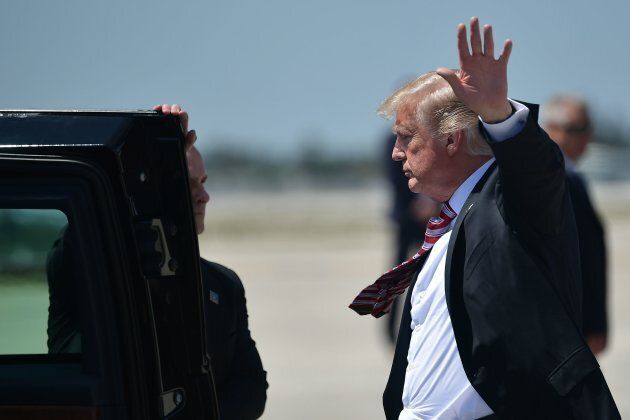 U.S. President Donald Trump steps off Air Force One.