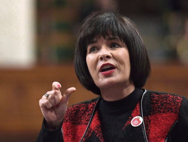 Minister of Health Ginette Petitpas Taylor rises during Question Period in the House of Commons on Parliament Hill on March 1, 2018.