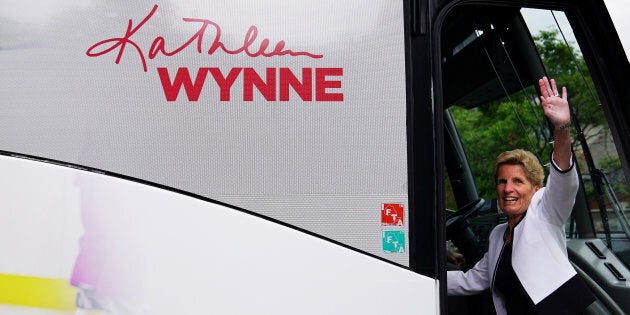 Ontario Liberal Leader Kathleen Wynne waves as she departs a campaign event in Toronto on June 5, 2018.