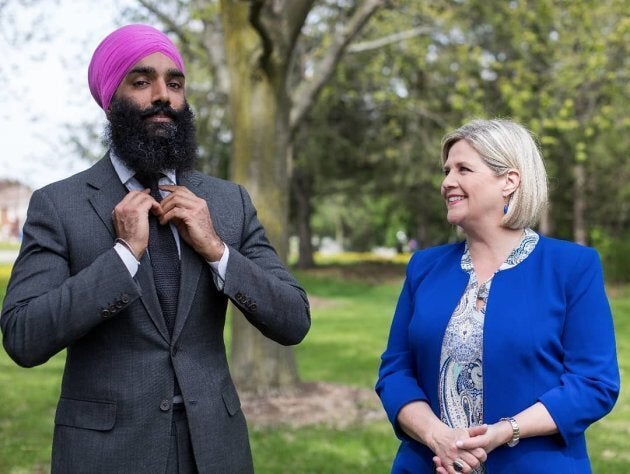 Gurratan Singh, who was elected to represent the riding of Brampton East in the Ontario election, poses alongside party leader Andrea Horwath.