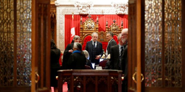 Senator Peter Harder. the government's representative in the Senate, waits for the start of a vote in the Senate chamber on Parliament Hill in Ottawa on March 22, 2018.