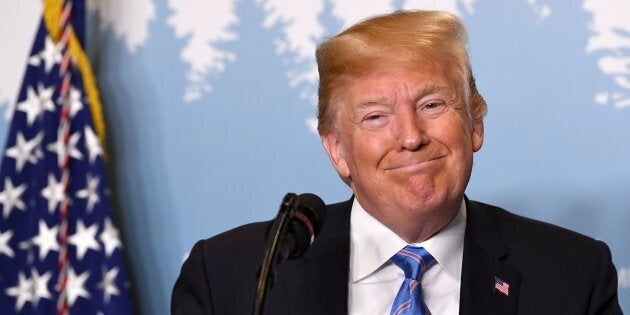 U.S. President Donald Trump speaks to reporters on June 9, 2018 at the G7 summit in La Malbaie, Que.