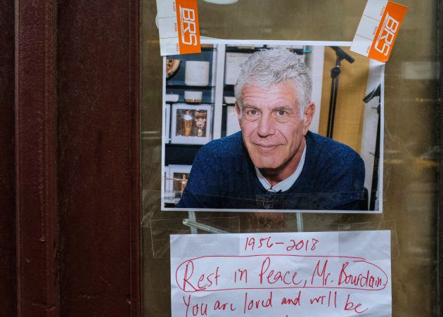 Notes, photographs and flowers are left in memory of Anthony Bourdain at the closed location of Brasserie Les Halles, in New York City, where Bourdain used to work as the executive chef, on June 8, 2018.