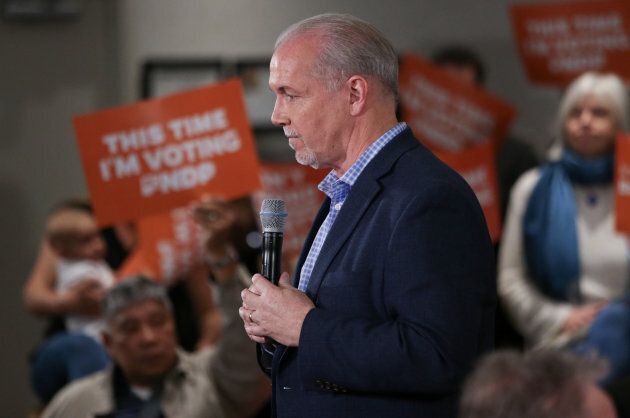British Columbia's New Democratic Party (NDP) leader John Horgan addresses supporters during a campaign stop at a hotel in Surrey, B.C. on May 8, 2017.