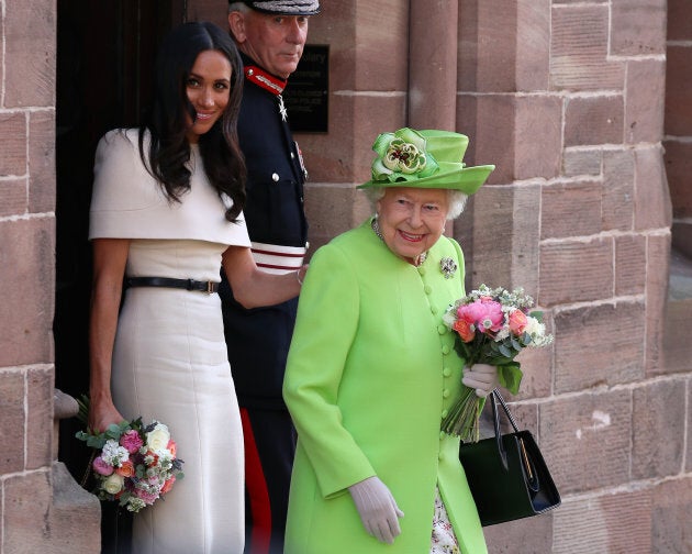 Queen Elizabeth II and Meghan, Duchess of Sussex leaving Chester Town Hall on June 14,.