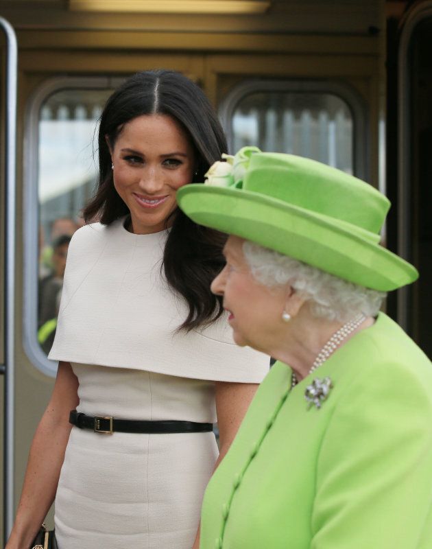 Queen Elizabeth II and the Duchess of Sussex arrive by royal train at Runcorn Station.