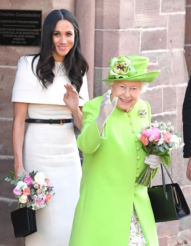 The Duchess of Sussex and Queen Elizabeth II depart Chester Town Hall, where they attended lunch on June 14.