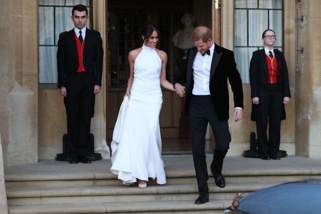 The Duke and Duchess of Sussex leave Windsor Castle after their wedding to attend an evening reception at Frogmore House on May 19.