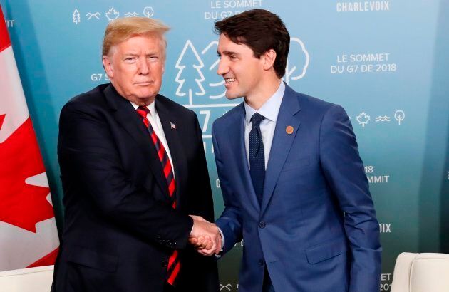 U.S. President Donald Trump shakes hands with Prime Minister Justin Trudeau in a bilateral meeting at the G7 Summit in in Charlevoix, Que. on June 8, 2018.