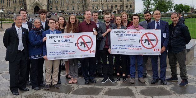 Survivors and families of victims of gun violence, alongside engineering students, call on Ottawa to ban assault weapons.