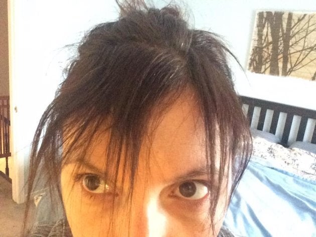 The author, 18 months after her son was born, wondering if she was bald after giving birth and people were too afraid to tell her.