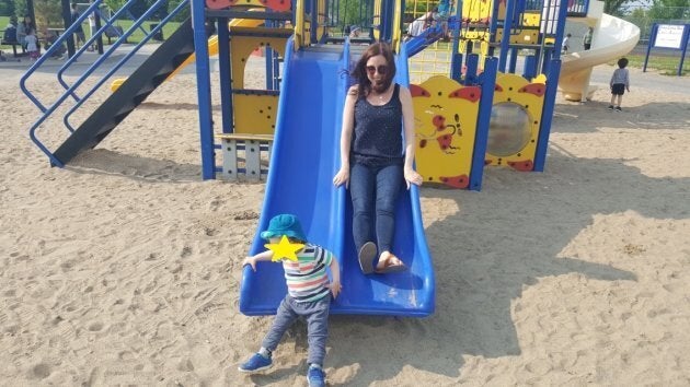 The author enjoying a day at the park with her son and LOOK AT MY HAIR!