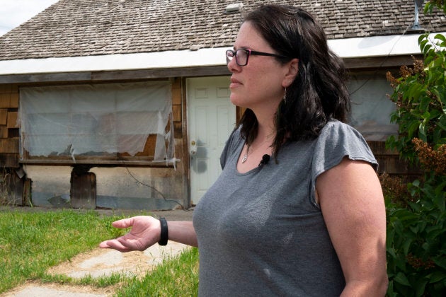 Rebecca Spreng Fletcher stands in front of her Auntie Jean's old home, where she spent a lot of time growing up. "We've had many elders who have wanted to come home but they've had no place to come to," she says.