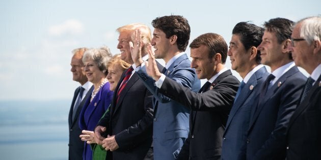 G7 leaders pose for a photo during the G7 Summit in La Malbaie, Que. on June 8, 2018.