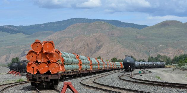 Steel pipe to be used in the oil pipeline construction of Kinder Morgan's Trans Mountain Expansion Project sit on rail cars at a stockpile site in Kamloops, B.C. May 29, 2018.