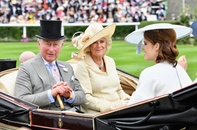 Prince Charles and Duchess of Cornwall arrive with Princess Eugenie and Princess Beatrice (who is not pictured).