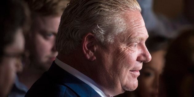 Ontario premier-designate Doug Ford, seen speaking to reporters on June 19, 2018, didn't participate in Toronto's Pride Parade.