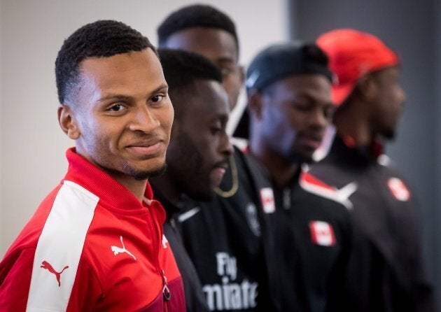 Canadian sprinter Andre De Grasse, front left, of Toronto, stands with the rest of the 4x100-metre relay team during a news conference for the Harry Jerome International Track Classic, in Vancouver, on June 25, 2018.