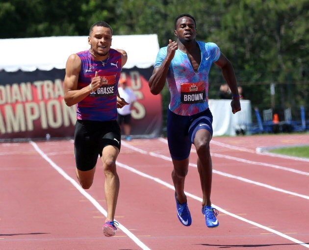 Andre De Grasse, left, takes the lead to the finish line beating Aaron Brown, right, to win gold in men's 200-metre race at the Canadian Track and Field Championships in Ottawa on July 9, 2017.