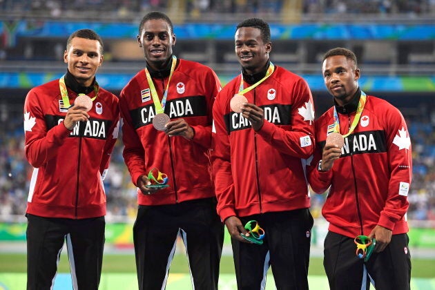 Canada's Andre De Grasse, left to right, Brendon Rodney, Aaron Brown and Akeem Haynes show off their 4x100-metre bronze medals at the 2016 Summer Olympics in Rio de Janeiro, Brazil on August 20, 2016.