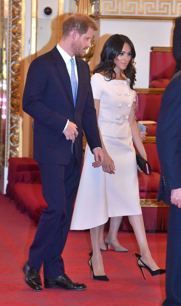 The Duke and Duchess of Sussex at the Queen's Young Leaders Awards Ceremony at Buckingham Palace, London.