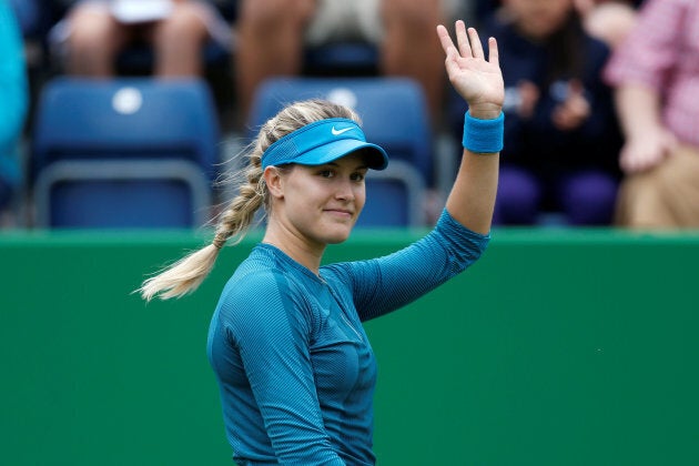 Eugenie Bouchard waves to the crowd after winning her qualifying round match against Australia's Priscilla Hon on June 17, 2018.