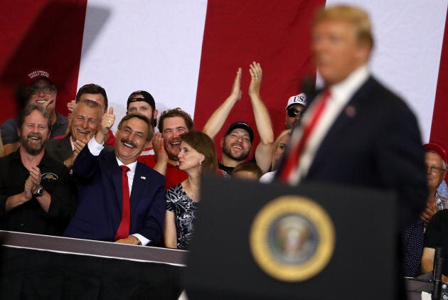 Suppoters cheer as U.S. president Donald Trump speaks during a campaign rally at Scheels Arena on June 27, 2018 in Fargo, North Dakota.