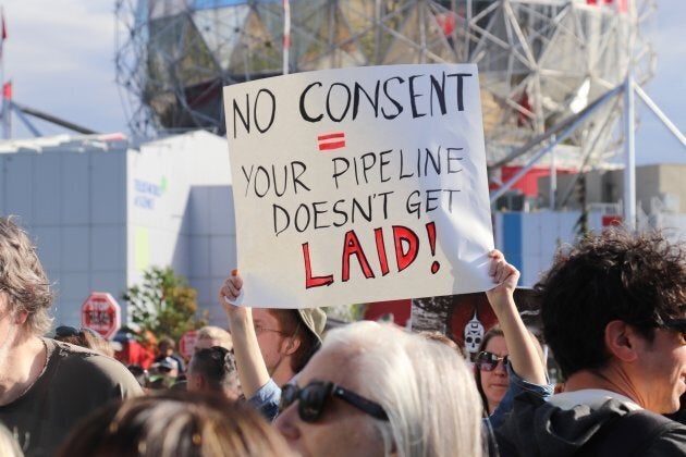 Protestors gather at the 'No Buyout, No Kinder Morgan' rally in downtown Vancouver on May 29, 2018.