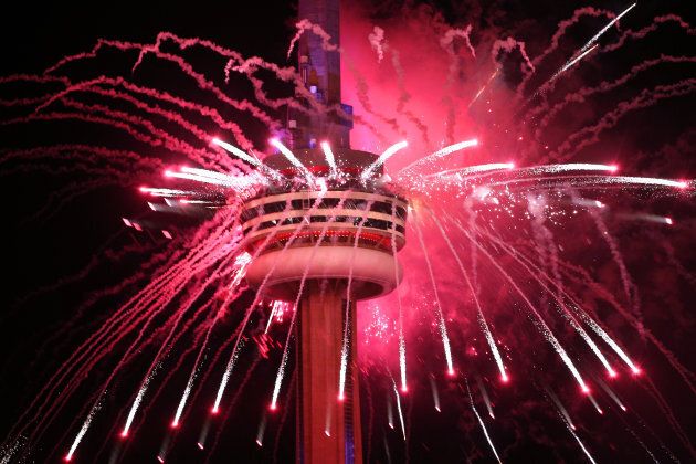 Canada celebrates its 150th birthday by launching fireworks off of the CN Tower in Toronto on July 1, 2017.
