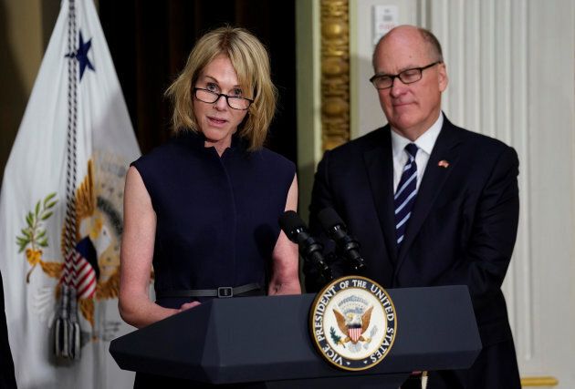 U.S. Ambassador to Canada Kelly Knight Craft speaks after she was sworn in, as her husband Joe Craft watches in Washington on Sept. 26, 2017.