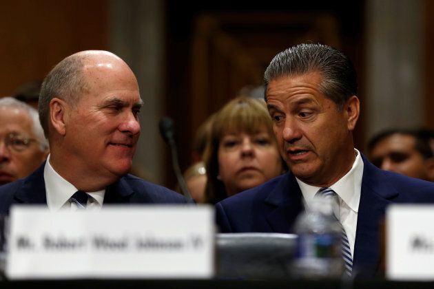 University of Kentucky men's basketball coach John Calipari, right, attends a U.S. Senate Foreign Relations Committee hearing in support of U.S. President Donald Trump's nominee to be ambassador to Canada, Kelly Knight Craft, on Capitol Hill in Washington on July 20, 2017.